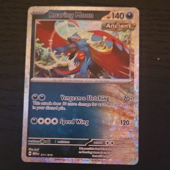 roaring moon holographic pokmon card is a rare pokemon Roaring Moon ex SAR SV8a: 218/187 Terastal Festival [Grass] x2 Retreat Cost Roaring Moon Ancient Holo Pokmon